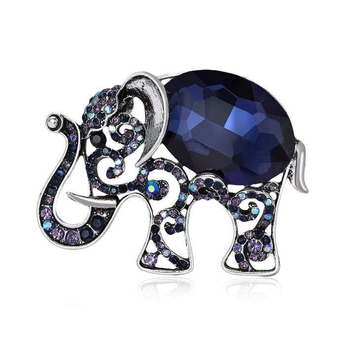 Scrollwork Elephant Brooch With Blue or Red Faceted Stone