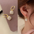 Pink Heart Charm Huggie Hoop Earrings in Gold Tone view 2