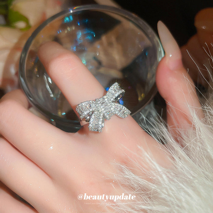 Silver Tone Clear Crystal Bow Ring With Baguette And Square Stones