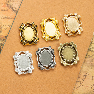 Small Baroque Oval Cabochon Settings in Six Finishes