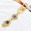Gold-Tone Rhinestone Hamsa Hand Keychain With Evil Eye Charm view 2