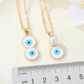Gold Tone White Evil Eye Pendant Necklaces in Two Drop Designs view 5