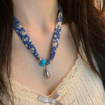 Floral Fabric Cord Necklace With Beads and Metal Pendants