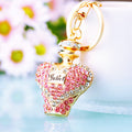 Heart Perfume Bottle Keychains in Pink Blue Champagne and Assorted Colors view 1