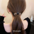Clear Spiral Coil Hair Ties With Large Silver Or Tan Round Bead Ends view 3