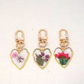 Gold Tone Pressed Flower Heart Resin Clip Keychains view 2