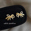 Gold Micro Pavé Crystal Rope Texture Bow Stud Earrings view 1