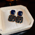 Geometric Crystal Stud Earrings with Sparkling Stone Details view 7