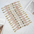 Gold Tone Initial Letter Keychain With Pink Enamel Bow Charm view 3