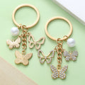 Butterfly Charm Keychains Featuring Gold Butterfly Across 34 Pictured Variations view 4