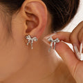 Bow Stud Earrings Gold Or Steel Titanium Metal Finish view 3