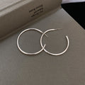 Slim Silver Round Hoop Earrings in Four Sizes with Polished Metal Details view 8