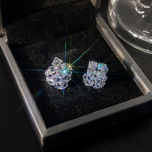 Clear geometric crystal cube studs in black velvet tray
