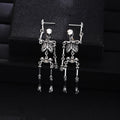 Silver and Gold Articulated Skeleton Dangle Earrings view 1
