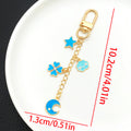 Six Purple and Blue Celestial Metal Clasp Keychain Designs view 8
