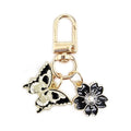 Gold Tone Butterfly Skull and Cherry Blossom Clip Keychains view 11