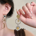 Gold and Silver Celestial Floral Asymmetric Stud Earrings view 6