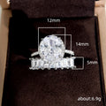 Oval Halo Stone and Tapered Baguette Band Ring Set view 5
