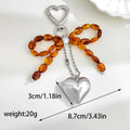 Beaded Bow Keychain With Heart Charm And Ball Chain view 4