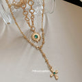 Layered Gold Tone Cross and Green Gem Pendant Necklace view 4