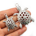 Openwork Turtle Shaped Metal Charms in Two Pictured Sizes view 1