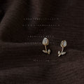 Gold Tone White Pearlescent Tulip Flower Stud Earrings For Women view 1
