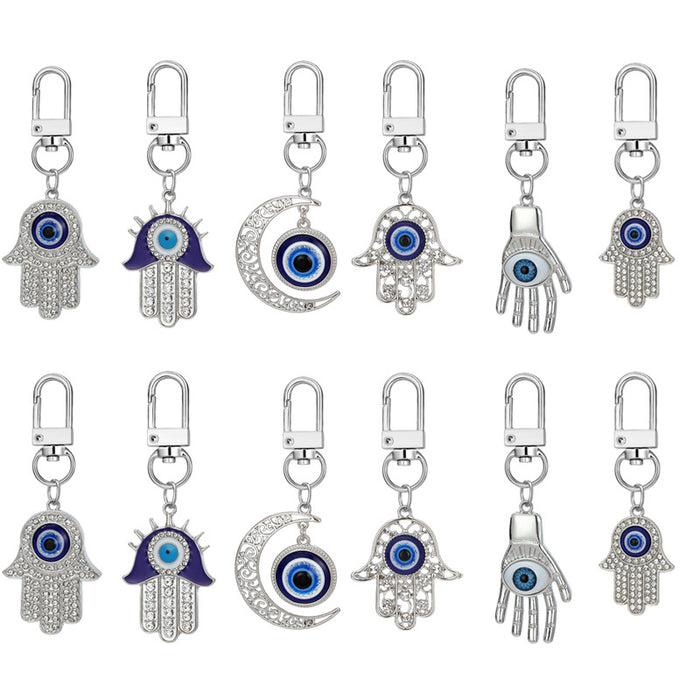 Twelve Piece Silver Tone Hamsa and Crescent Evil Eye Keychain Set