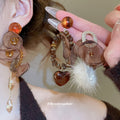 Brown Mesh Pom Pom and Petal Drop Stud Earrings Jewelry Pair view 2