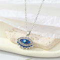 Gold and Silver Tone Crystal Blue Evil Eye Pendant Necklaces view 2
