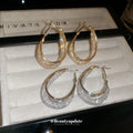 Textured Oval Hoop Earrings In Gold And Silver Tones view 4