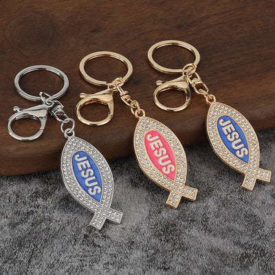 Blue, pink and white JESUS fish keychains