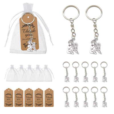 Kneeling angel keychains shown beside white organza bags and brown thank-you tags.
