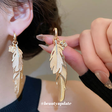 Gold Layered Feather Huggie Earrings with Cutout Details