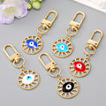 Gold Tone Crystal Openwork Round Evil Eye Clip Keychains in Five Colors view 1