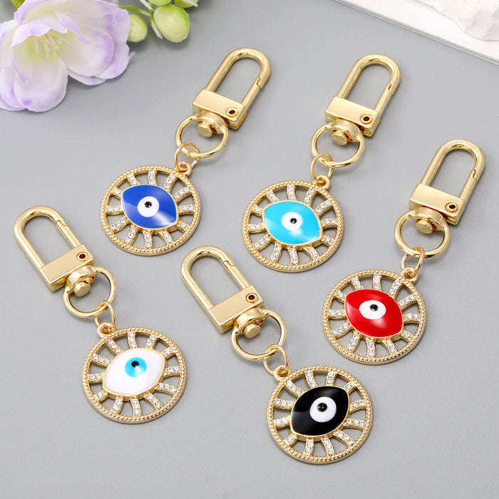 Gold Tone Crystal Openwork Round Evil Eye Clip Keychains in Five Colors