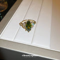 Gold Tone Olive Green Marquise Crystal Ring With Fan Side Clusters view 4