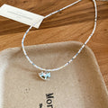Blue Beaded Rocking Horse Necklace with Distinctive Textured Details view 6