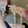 Floral Crystal Drop Earrings In Silver And Gold Tones view 1