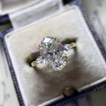Large Oval Solitaire Three-Stone Ring In Polished Gold Tone view 3