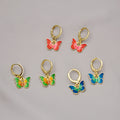 Gold Tone Painted Butterfly Small Huggie Earrings in Two Colors view 1