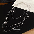Silver Tone Layered Necklace with Stars and Floral Charms view 2