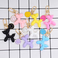 Gold Tone Balloon Dog and Smile Disc Clip Keychains view 2