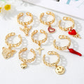 Gold Tone Curb Chain Heart Animal and Smiley Charm Rings view 1
