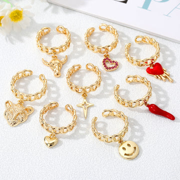 Gold Tone Chain Cuff Rings with Eight Dangling Charm Designs