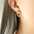 Gold Tone Sunburst C Hoop Earrings With Clear Stones view 1