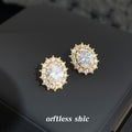 Gold Tone Clear Oval Faceted Stone Double Halo Stud Earrings view 1