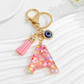 Pink Confetti Resin Letter Evil Eye Charm Tassel Keychain view 2