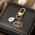 Gold Tone White Shell Evil Eye Charm Clip Keychains in Six Shapes view 5