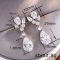 Silver Tone Leaf Cluster Teardrop Earrings With Clear Stones view 4