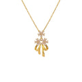 Gold Tone Bow And Flower Pendant Necklace With Teardrop Charms view 5